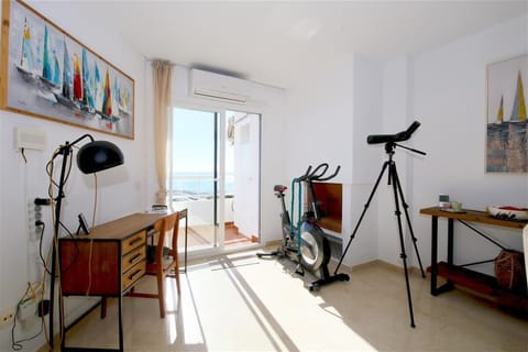 Other side of the lounge with working area