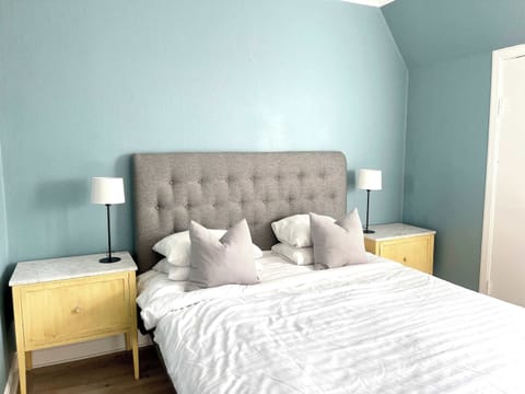 Bedroom 1 featuring a cozy double bed.