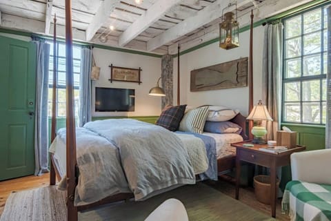 The 2nd-floor Cooperage Guest Room is perhaps my favorite because it hugs you and calls out coziness with this well-appointed queen-size four-poster bed.  
