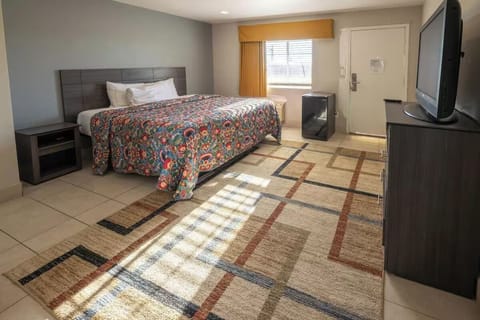 Settle in and enjoy a roomy retreat with restful king bed.