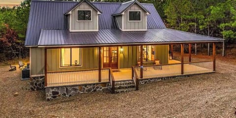 Wild Honey Cabin offers a prime location with spacious accommodations in a beautifully designed new structure surrounded by natural forest landscape.
