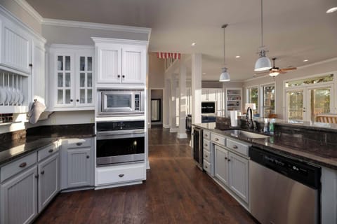 Open, bright, and ready to serve—our kitchen is basically an invitation to gather, laugh, and eat your way through vacation.