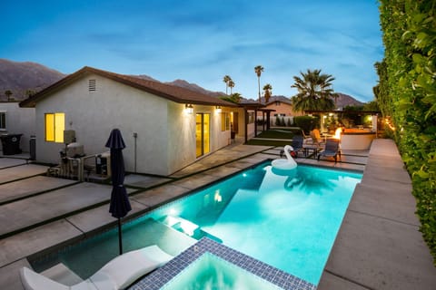 Private hot tub next to the pool, perfect for relaxing nights