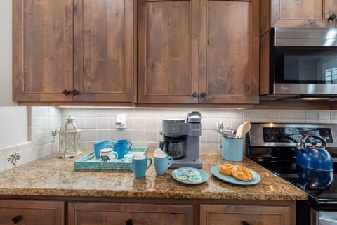 The open layout seamlessly connects the kitchen to dining areas, making hosting easy and enjoyable.