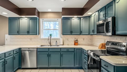 Whip up a gourmet meal or just pour yourself a cup of coffee—our kitchen is ready for your culinary adventures (or just a casual snack).