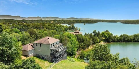 Welcome to Lighthouse Lookout by Beyond Expectations, which boasts both serene lake and mountain views.  Best of both worlds!!