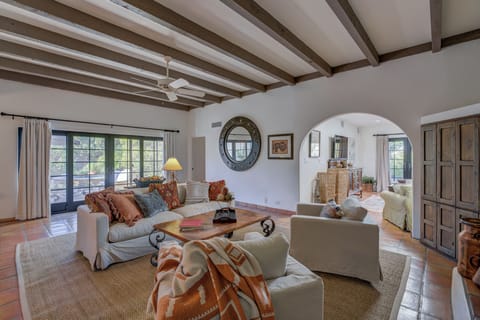 The tasteful home design includes artisan tile floors and hardwood.