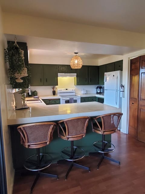 Bar stool seating for three.