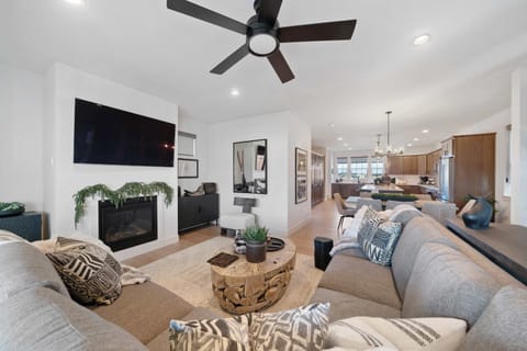 Living Room: Mountain views, modern vibes, and total comfort. Our living room is the ultimate short-break sanctuary. Curl up on the plush sectional, watch a movie on the big screen, and let the Bridger Mountains be your backdrop.