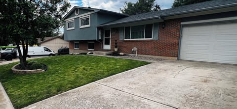 Spacious multi-level 4-bedroom home with two driveways.