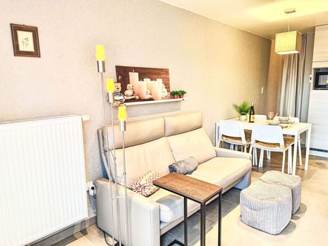 Furniture, Interior Design, Flooring, Floor, Couch, Wood, Room, Living Room, Lighting, Apartment