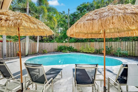 Sparkling heated pool with tropical vibes.