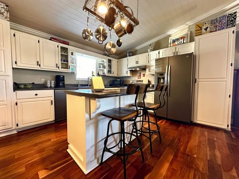 Kitchen with bar top seating