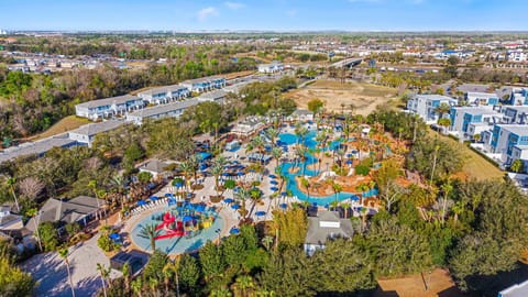 Resort vibes steps away-palm‑lined pools, lazy‑river paths, kid‑friendly splash zone, and plenty of loungers and cabanas for sun‑soaked days.