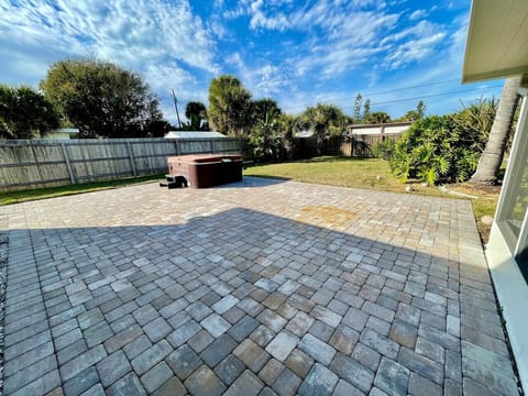 Fenced in Backyard with Hot Tub and Screened in Porch!