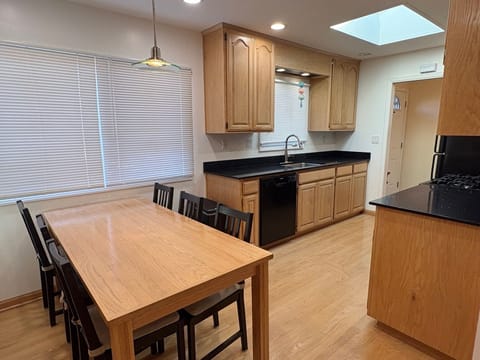 Full kitchen and dining area