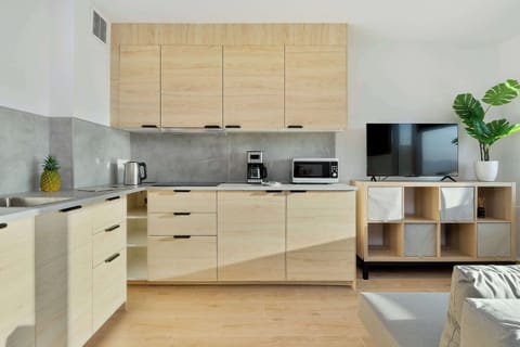 The fully equipped kitchenette includes everything you need for a home-cooked meal.