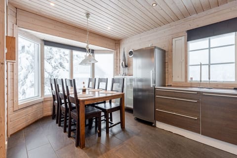 A bright dining area where you can enjoy meals while watching the seasons change.