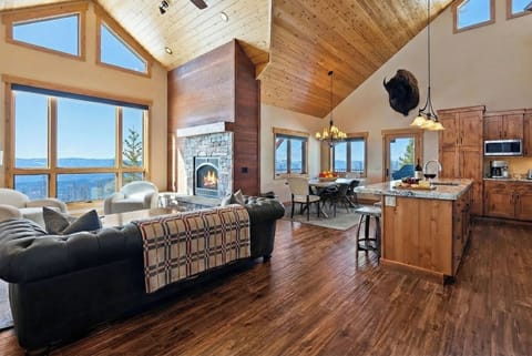 Relax by the fire with Flathead valley views in the vaulted great room.