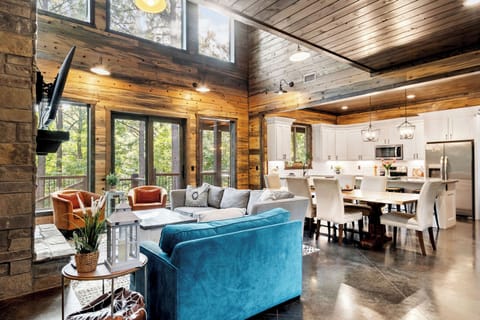 Living Room: Sunlit retreat with vibrant seating, stunning views, and a perfect gathering space!