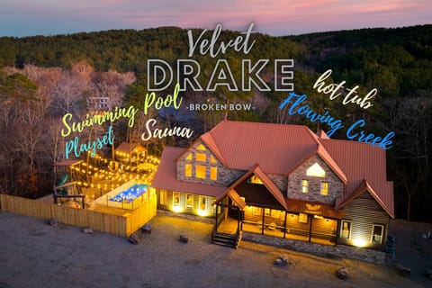 Exterior: Experience luxury with a pool, hot tub, and charming lights under starry skies!