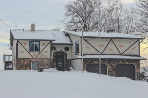 Welcoming winter arrival—plenty of parking and a cozy retreat waiting inside