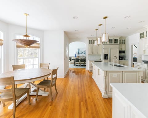 Eat-in kitchen looking at formal dining room.