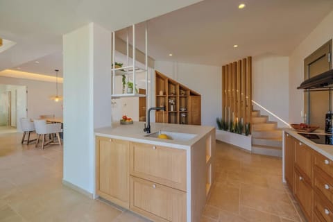 Spacious open-plan kitchen blending luxury and functionality