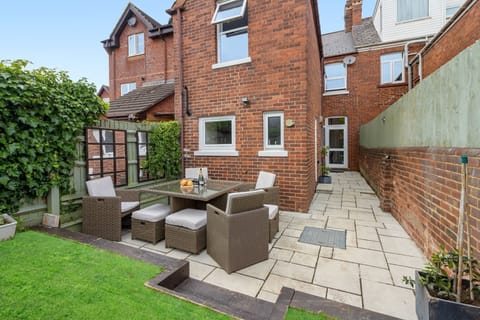 Enjoy al fresco dining in the private South facing garden