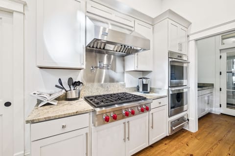 Your gourmet kitchen awaits with professional-grade appliances and granite counters for creating memorable meals.