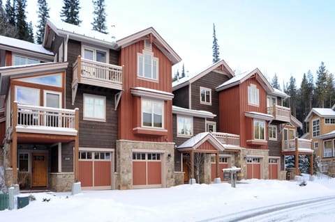 Welcome to the Ski Tip Townhomes—charming mountain retreats nestled in the snow near White River National Forest, just minutes from River Run Gondola and village amenities.