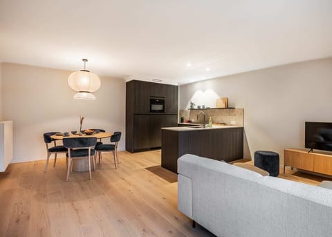 Bright and modern dining area with direct access to terrace