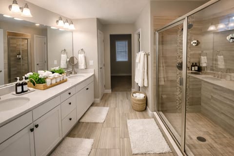 Stylish full bathroom with luxury toiletries and plush hotel-quality towels