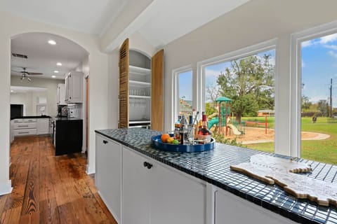 Bar Space Including Wine Cooler & Drinkware.  