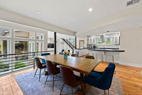 Dining Room Table Sits 8 and is Connected to Kitchen & Den