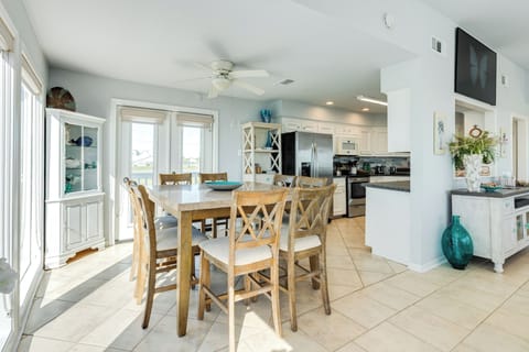 Easily serve homecooked meals from the adjacent kitchen