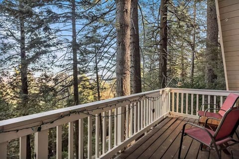Private forest-view deck with seating for peaceful mornings and sunsets