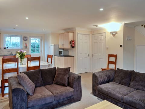 Furniture, Interior Design, Couch, Wood, Flooring, Floor, Ceiling, Room, Table, Living Room