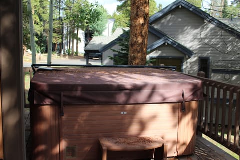 Hot Tub - Located just steps from the rear patio offering easy access from the main living areas while still feeling tucked away and serene.
