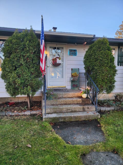 Access home through the back door. This door contains a standard lock. 