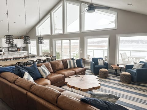 Lake Life's great room features floor to ceiling windows that overlook Jimmerson Lake