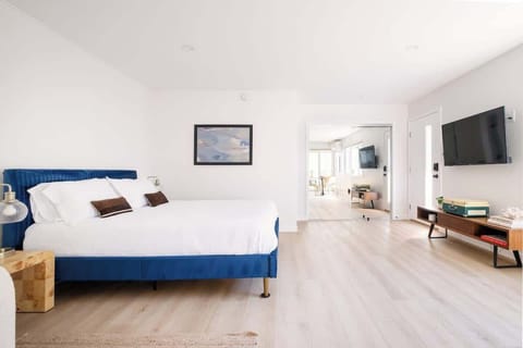 This bright, beachside retreat is your next home away from home just steps from the ocean