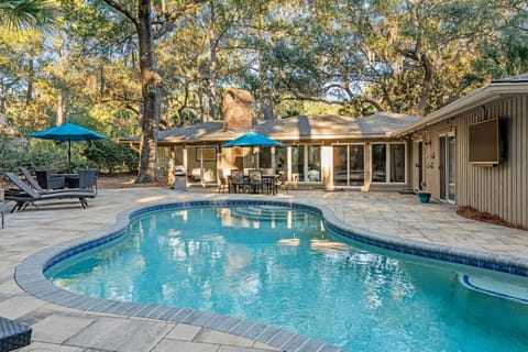 Backyard with pool & outdoor TV