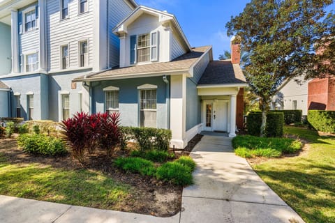Private Heritage Crossing townhome in Reunion Resort, just steps from the community pool and scenic walking paths.