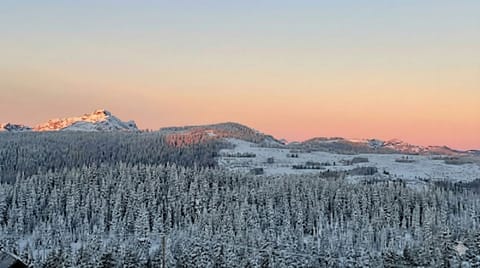 Stunning top-floor sunset views over the mountain.