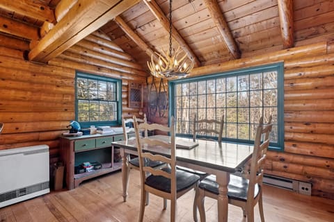 Enjoy breakfast by the windows, surrounded by trees and quiet