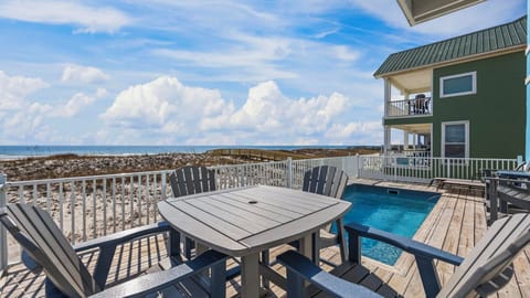 Miami Vice - - Dine outdoors and relax in your private heated pool while taking in panoramic Gulf views.