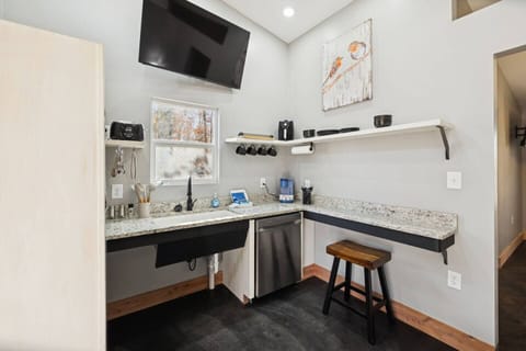 Fully Furnished Kitchen with Coffee and Dining Bar