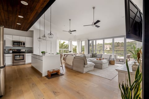 Open kitchen and living space filled with natural light
