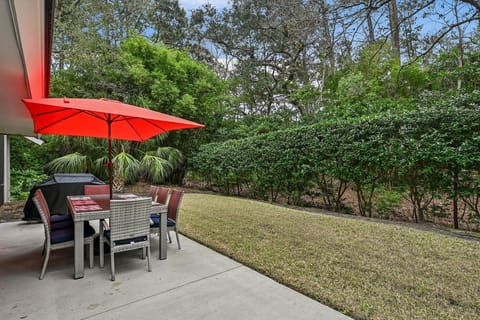 Private Patio with Dining Table and BBQ Grill at 36 Wisteria Lane